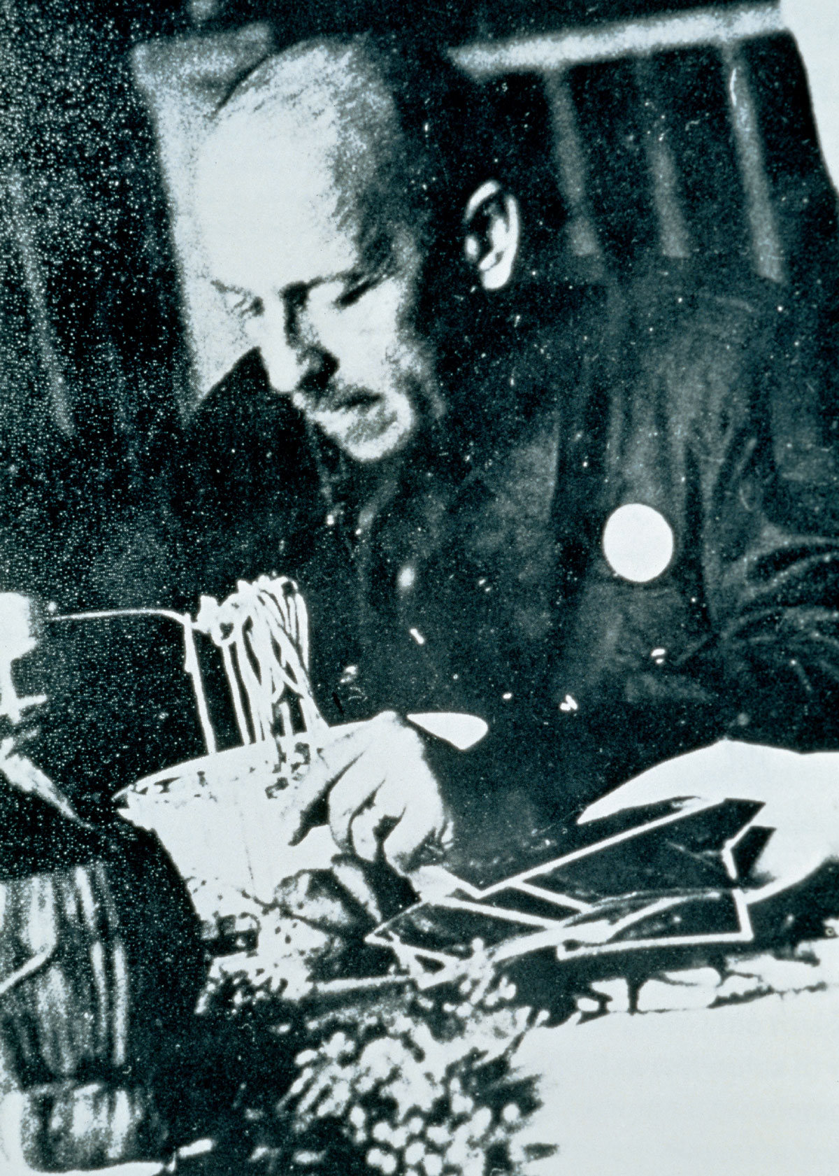 Photograph of Marinetti eating pasta at Milan’s Biffi restaurant, 1930.