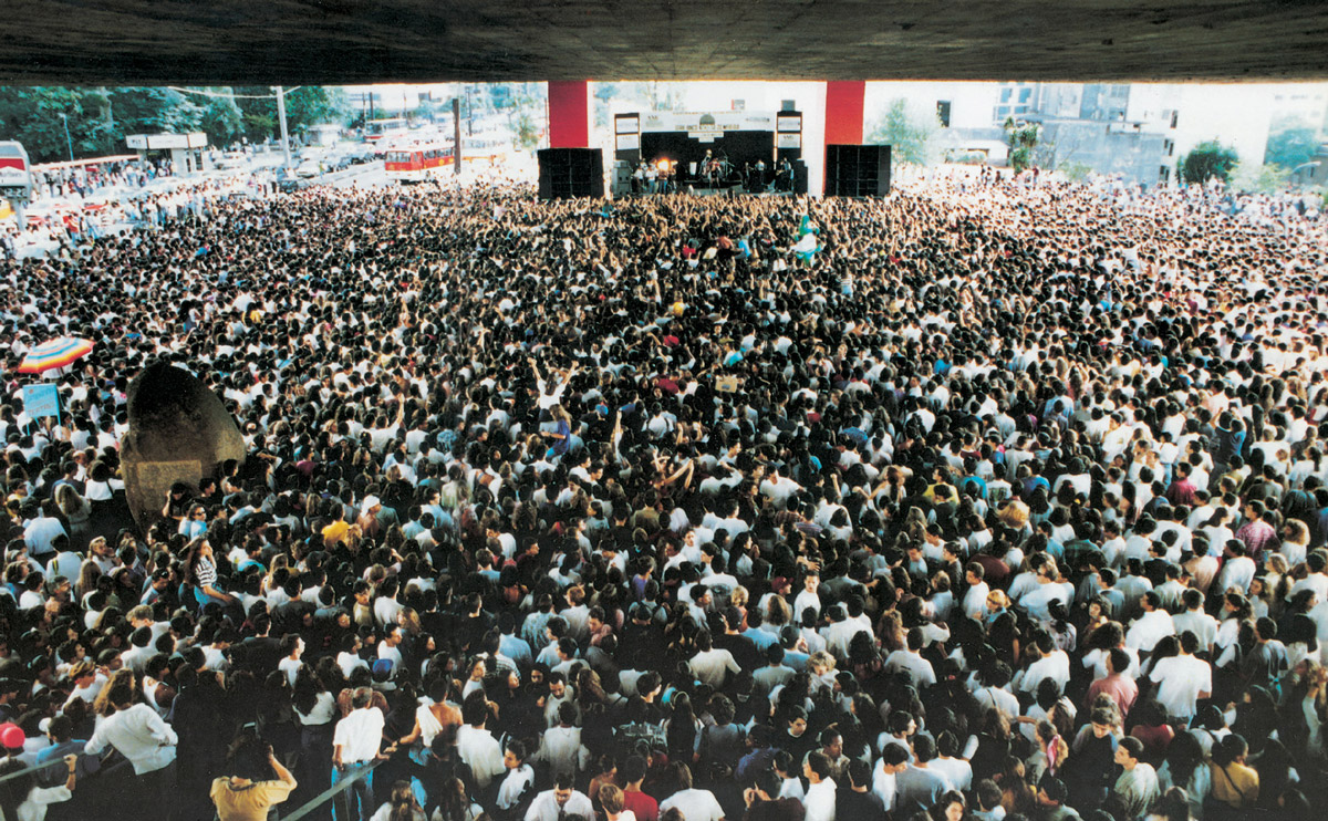 Photograph taken from above by Lina Bo Bardi of a crowd of people under the Sao Paolo Art Museum, 1957–1968.