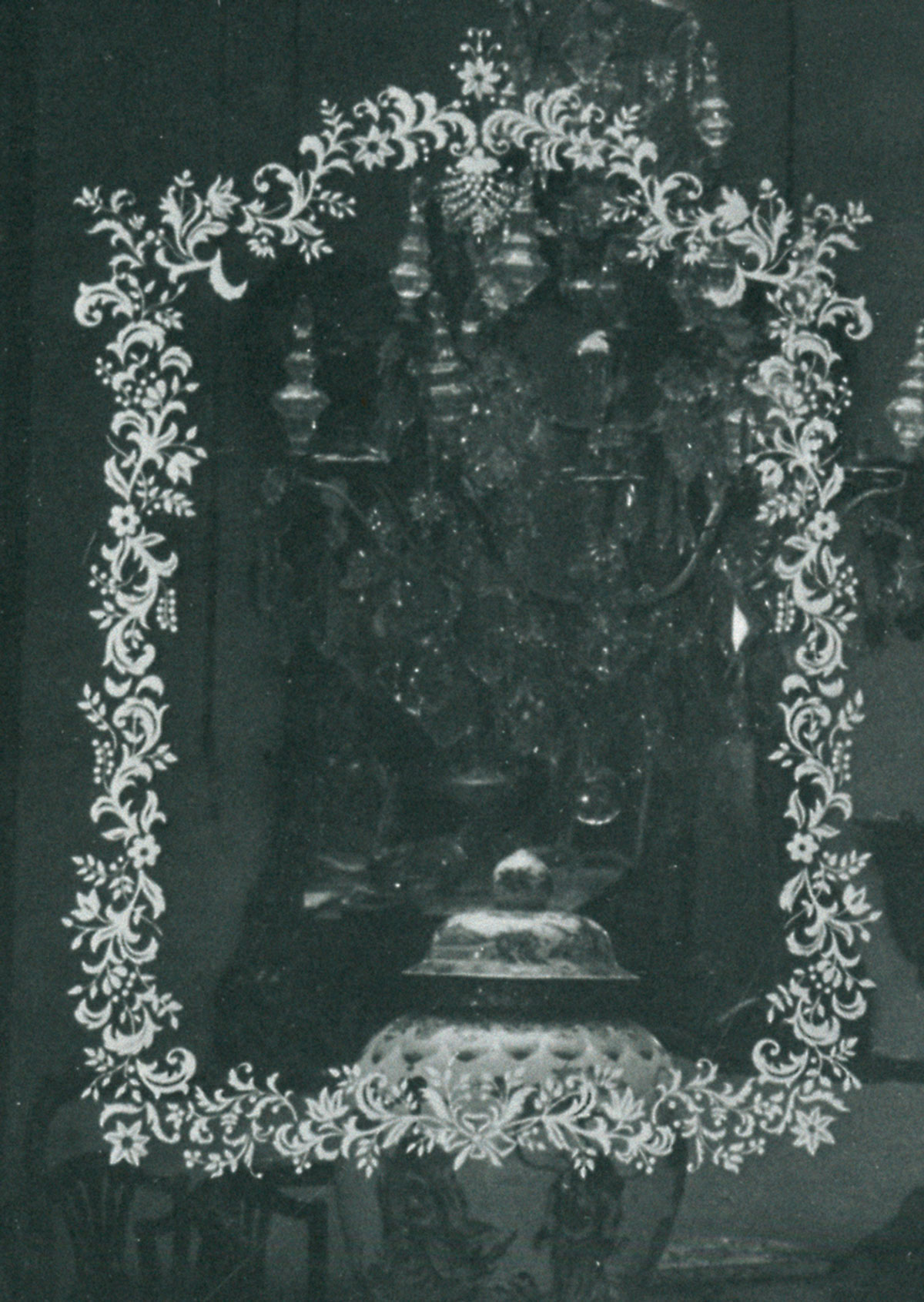 A photograph of an engraved eighteenth-century Italian mirror.