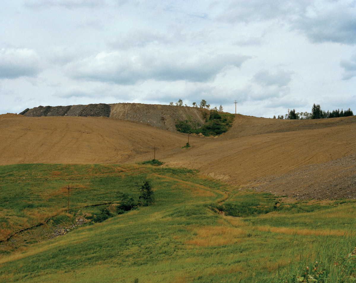 A photograph of a landscape depicting mine reclamation in progress, Clearfield County, Pennsylvania.