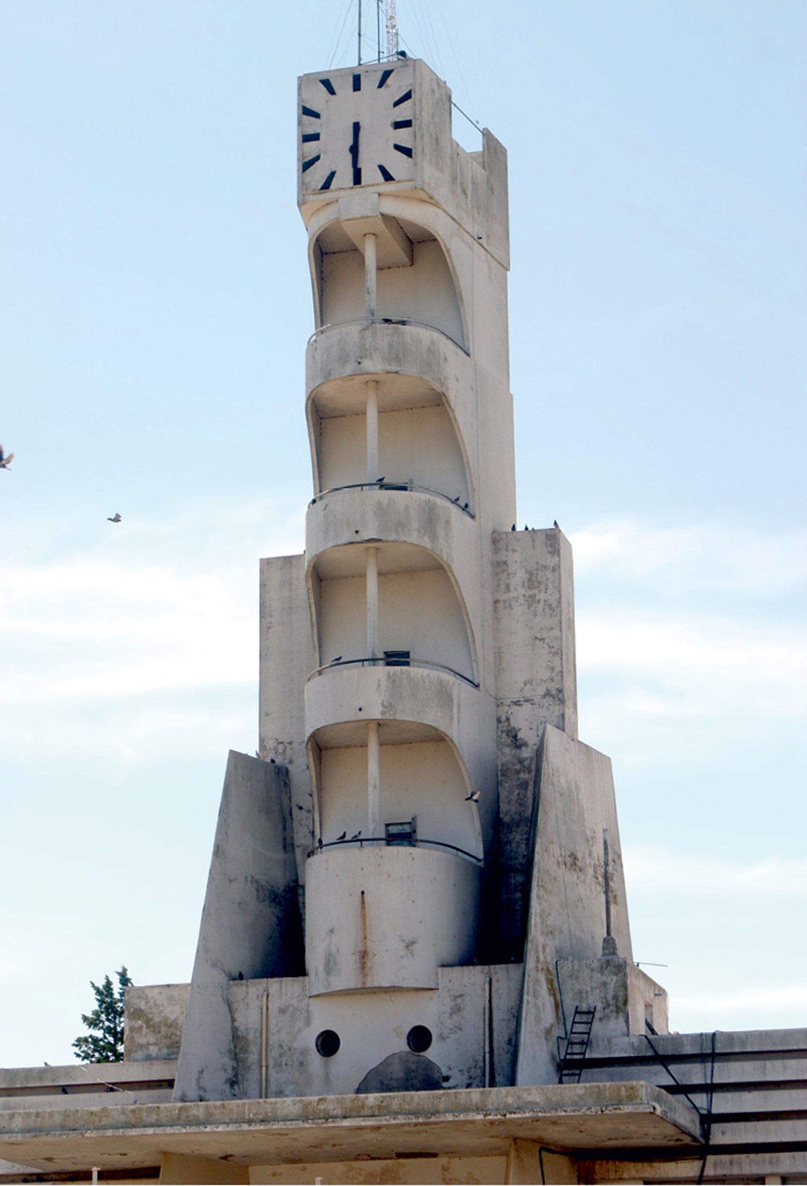 A photograph of a town hall designed by architect Francisco Salamone.