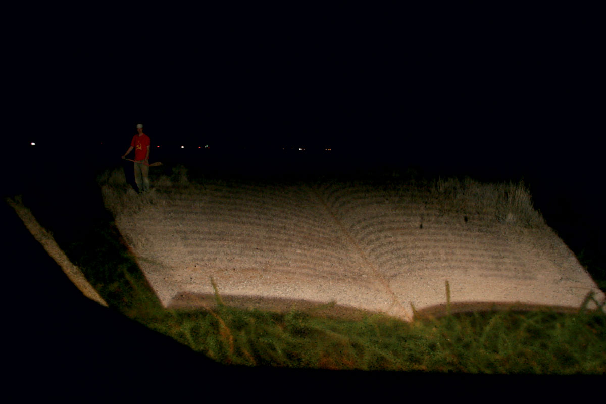 A 2009 photograph showing the reconstruction of Cabnetlandia in the desert outside Deming, New Mexico. 