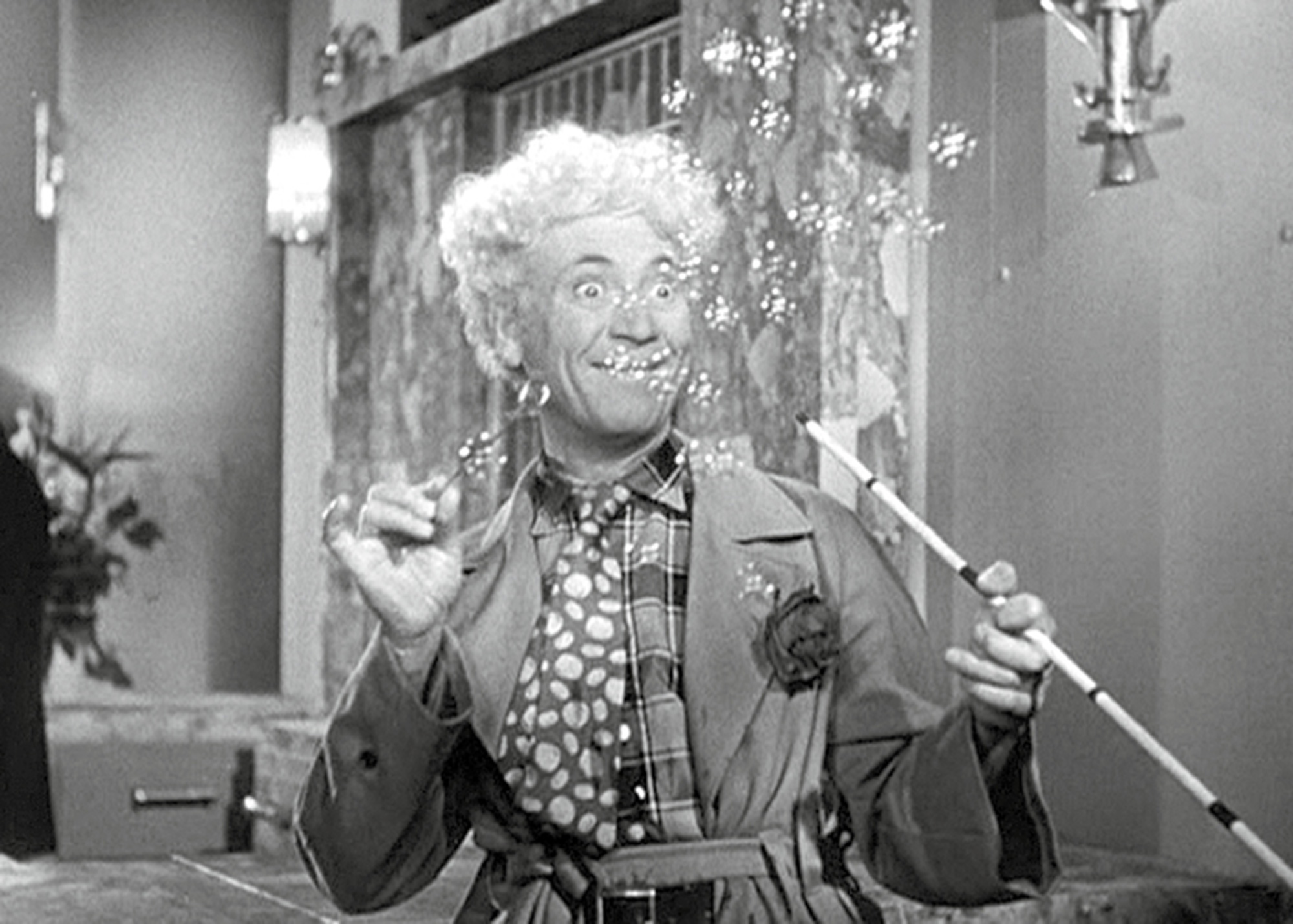 A still from the nineteen forty six film “A Night in Casablanca” depicting Harpo Marx blowing bubbles.