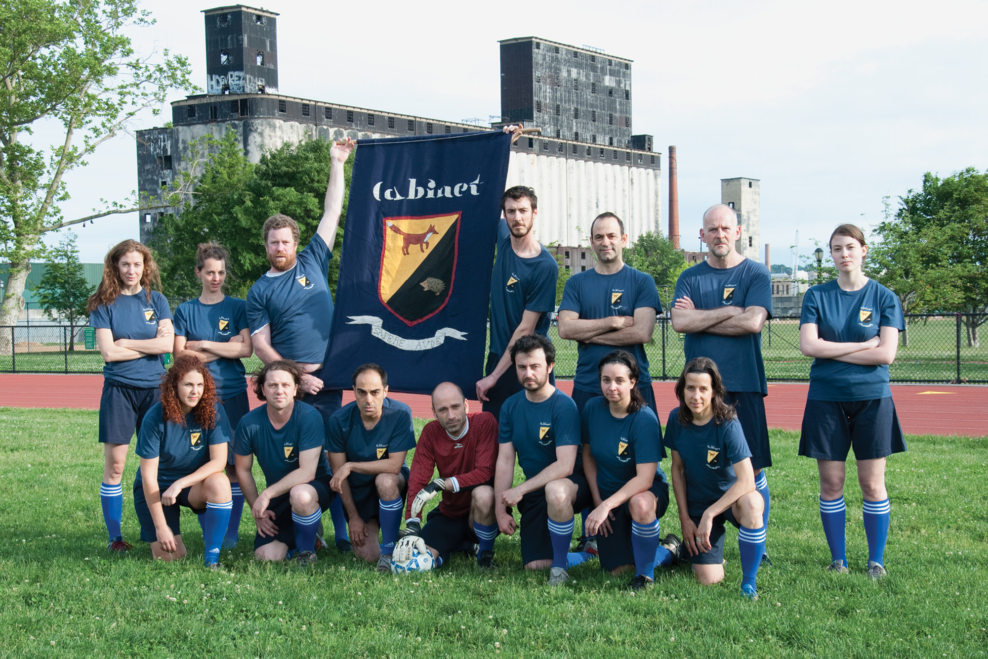 A photograph of Cabinet Soccer Club’s players in full regalia. 