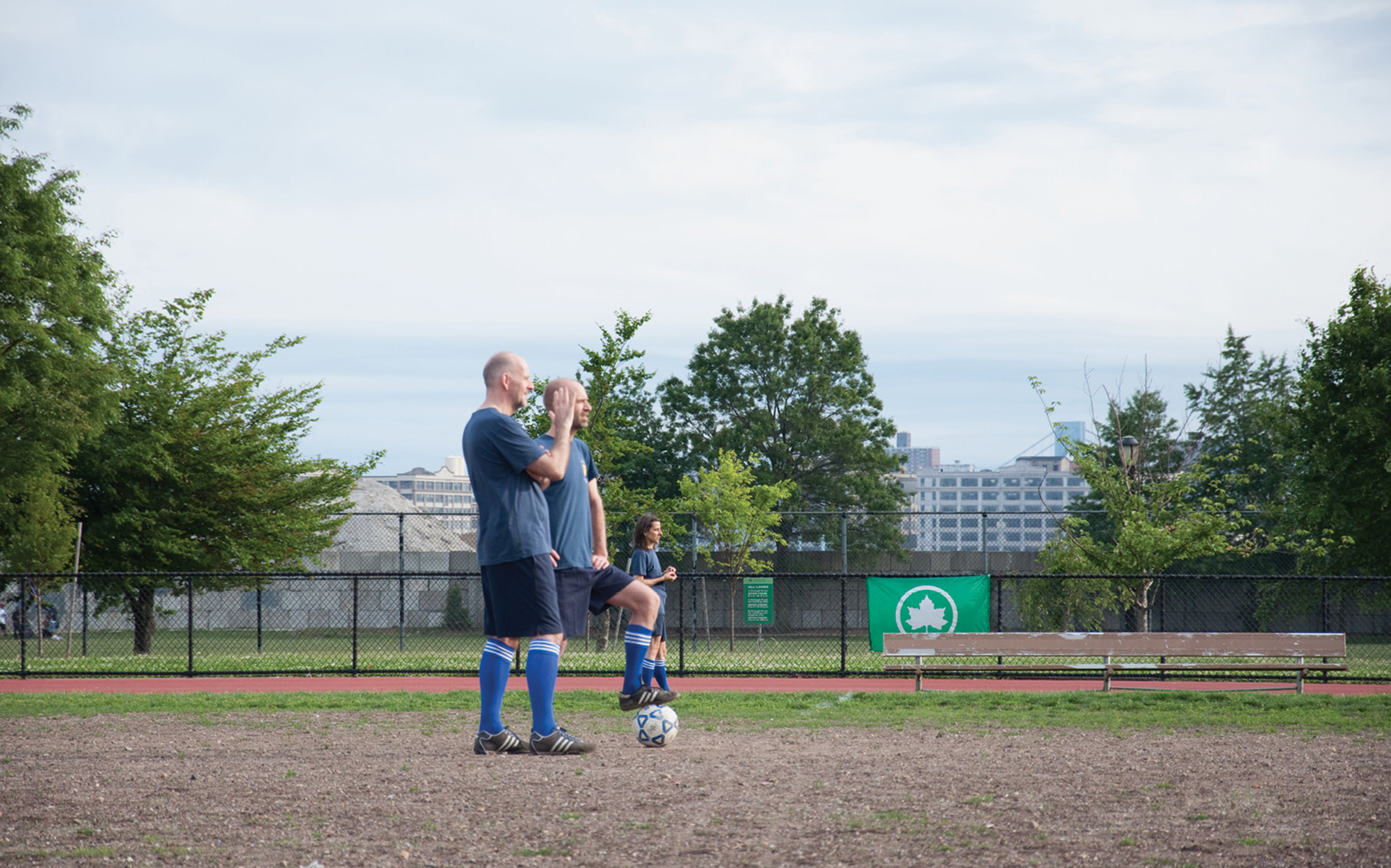 A photograph of Cabinet Soccer Club on the field right before they are finally declared winners as a result of their opponents forfeiting the game for not showing up.