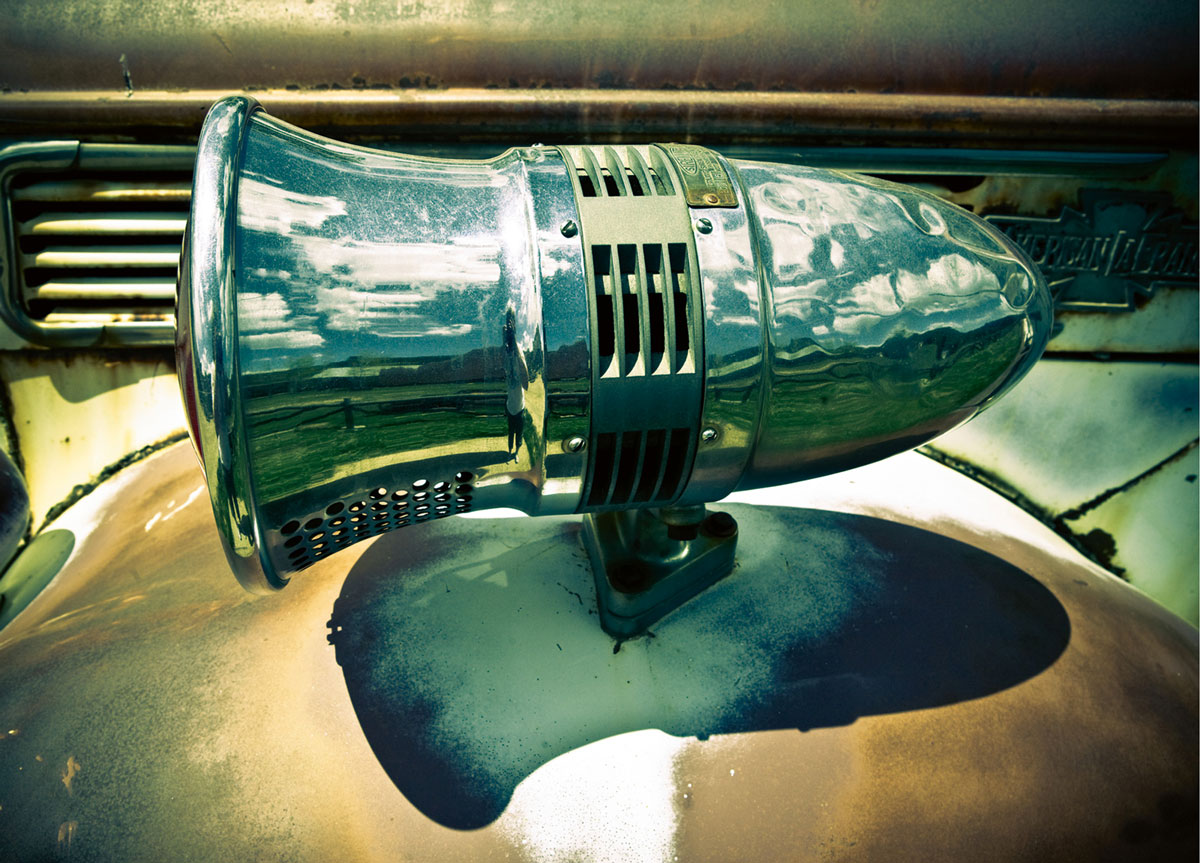 Antique siren on a fire truck in Colorado.