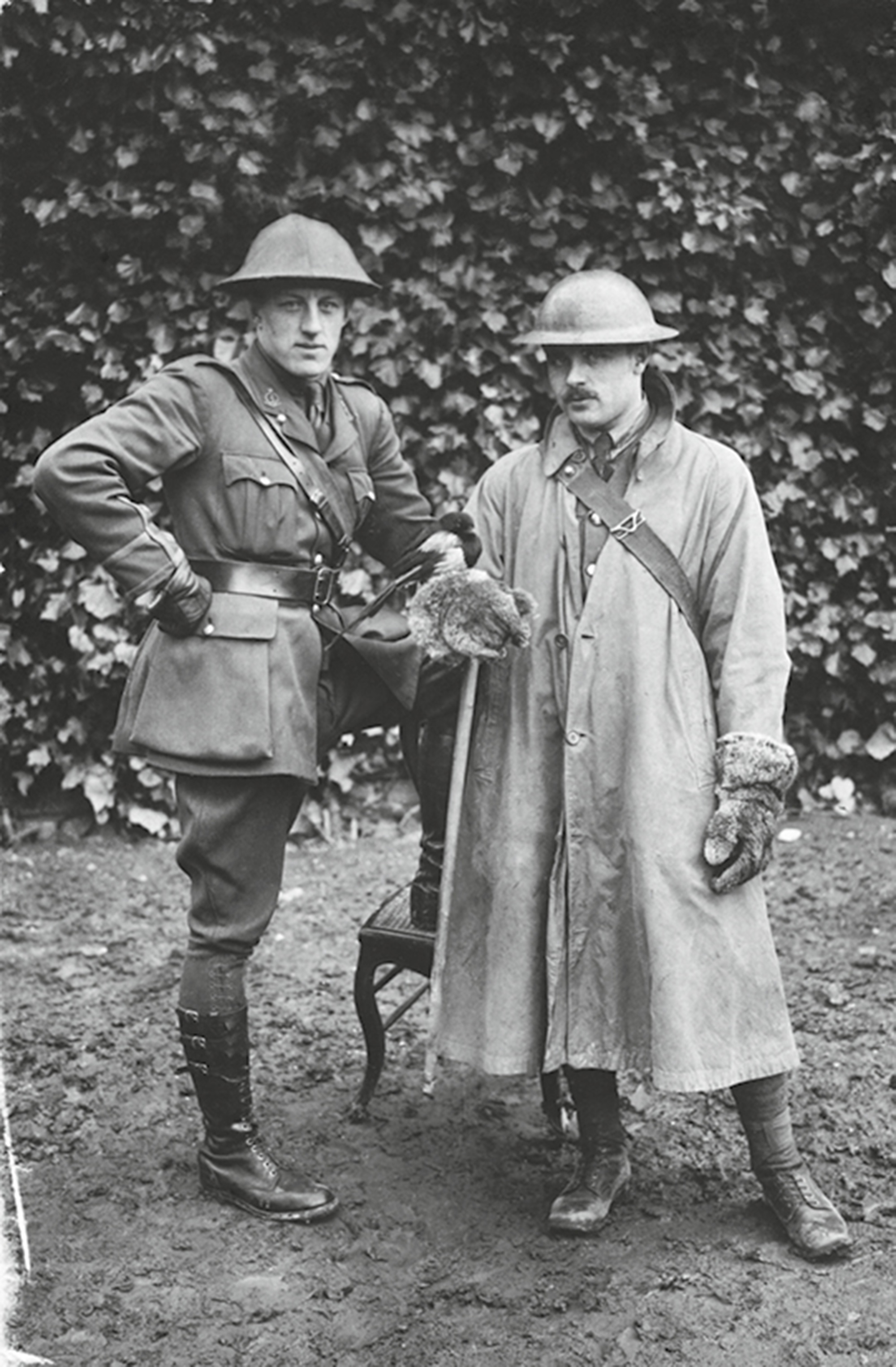 A nineteen seventeen photograph of Leon Underwood holding a magpie.