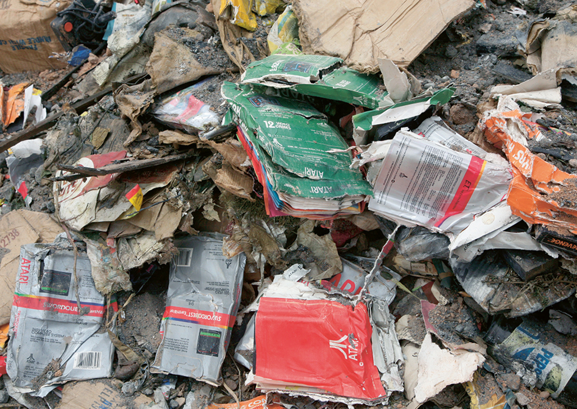 A photograph of discarded merchandise at the Atari Incorporated landfill site in Alamogordo, New Mexico.