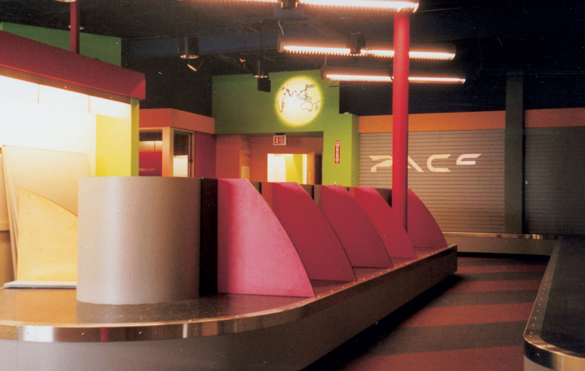 A photograph of the empty interior of an abandoned travel agency.