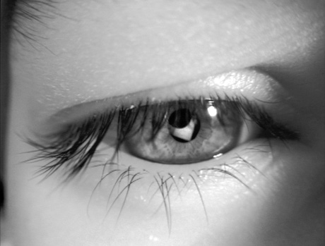 A close-up photograph of a child's eye by artist Wendy Ewald, circa 2002.